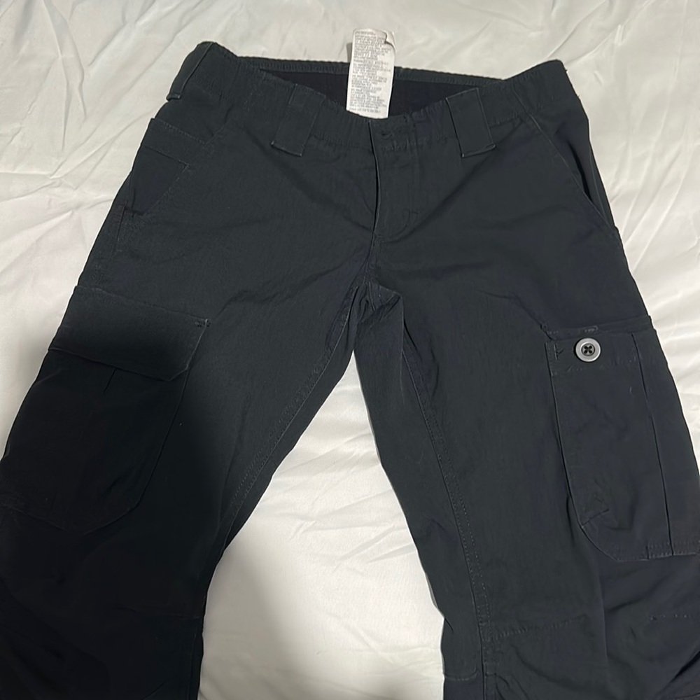 Two pairs of under armour tactical pants.